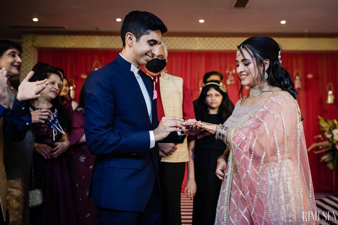 Ring exchange during an engagement ceremony